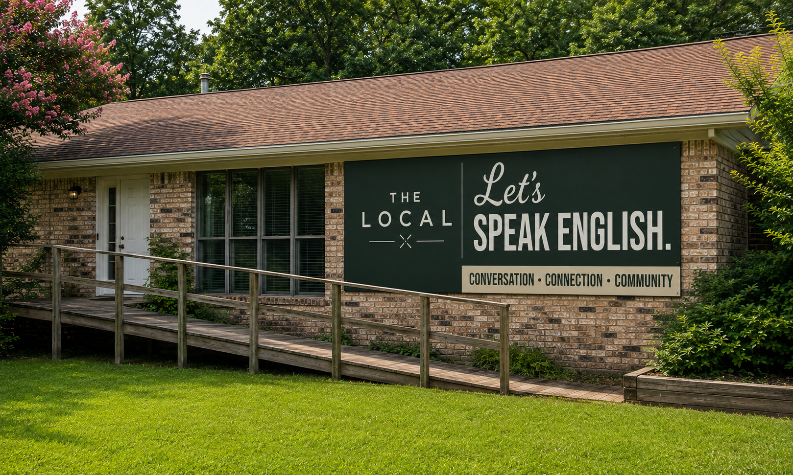 The Local building entrance with the Let's Speak English banner and a wooden ramp leading to the door